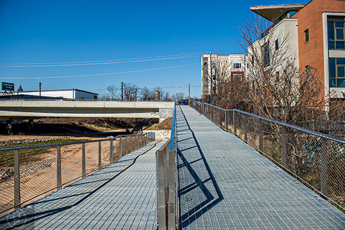 The Edgewood Avenue Bridge is completed and open with a ramp on one side and stairs on the other to connect to the Beltline.