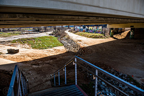 The Edgewood Avenue Bridge is completed and open with stairs on one side and a ramp on the other to connect to the Beltline.