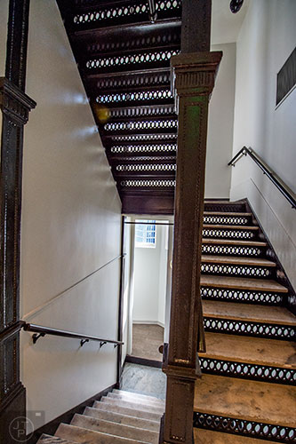 Steel and granite staircases lead to different floors inside FlatironCity in Atlanta.