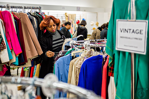 Ruth Hayes shops for vintage clothes during the 25th annual Sandy Springs Society Tossed Out Treasures sale at Marshall's Plaza in Sandy Springs on Saturday, February 27, 2016. 