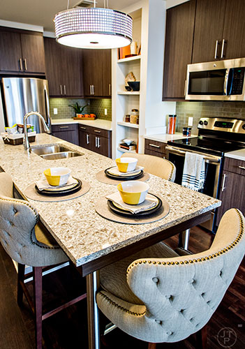 The kitchen in the one bedroom model apartment at The High Rise at Post Alexander in Buckhead.