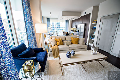 The living room in the two bedroom model apartment at The High Rise at Post Alexander in Buckhead.