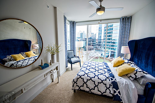 One of the bedrooms in the two bedroom model apartment at The High Rise at Post Alexander in Buckhead.