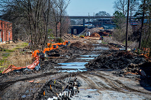 The Westside Trail is under construction. Right now it's a mud pit but eventually it will connect Gordon White Park to Adair Park using the old railroad corridor.