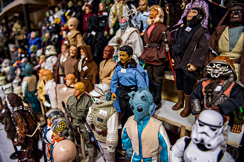 A Lando Calrissian doll is surrounded by others during Joelanta and the Great Atlanta Toy Convention at the Marriott Century Center in Atlanta on Saturday, March 12, 2016. 