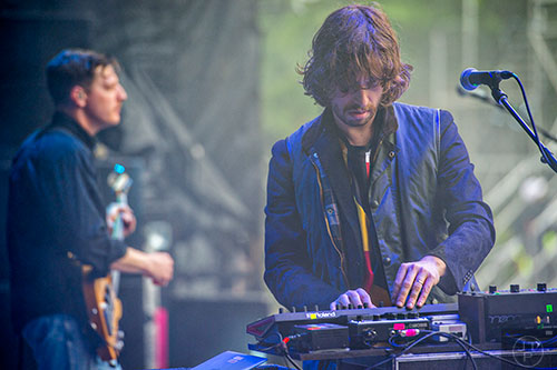 Yeasayer's Chris Keating (right) and Ira Wolf Tuton perform during the first night of the Shaky Beats Music Festival at Centennial Olympic Park in Atlanta on Friday, May 20, 2016. 