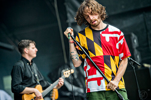 Yeasayer's Chris Keating (right) and Ira Wolf Tuton perform during the first day of the Shaky Beats Music Festival at Centennial Olympic Park in Atlanta on Friday, May 20, 2016. 