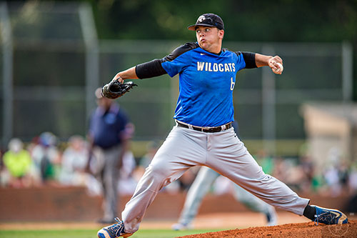 Locust Grove starting pitcher Christian Young hurls the ball towards the plate during the final game of the Class AAAA baseball championships against Buford on Monday, May 23, 2016. 