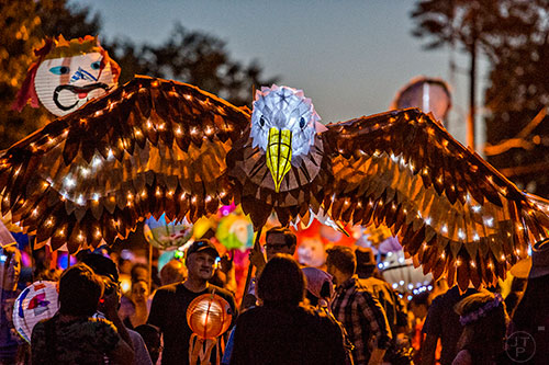 Thousands of people wait for the start of the third annual Decatur Lantern Parade on Friday.
