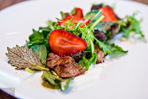 The skillet chicken livers with wild greens and strawberries at Linton's.