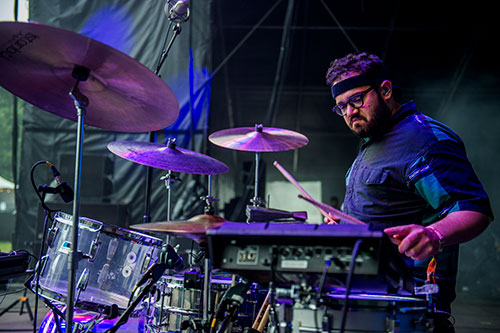 Christopher Berry plays the drums as Yeasayer performs on stage during the first day of the Shaky Beats Music Festival at Centennial Olympic Park in Atlanta on Friday, May 20, 2016.