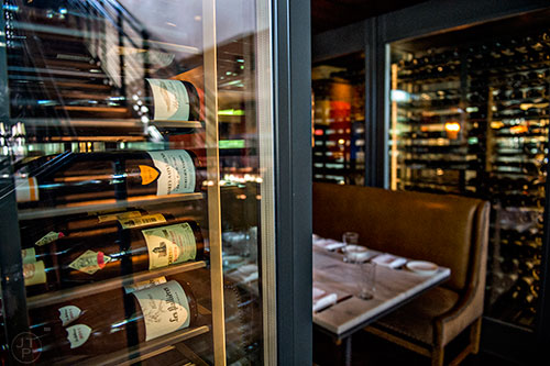 Coolers filled with bottles of wine surround a private table at South City Kitchen in Buckhead.