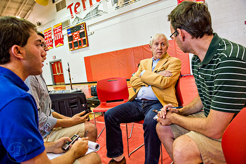 Fran Tarkenton (center) speaks to members of the media at Clarke Central High School in Athens on Tuesday, May 10, 2016.