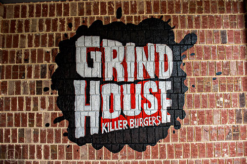 The mural outside welcoming people to Grind House Killer Burgers in Decatur.