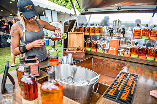 It's not all food at the tasting tents in Piedmont Park during the Atlanta Food & Wine Festival on Sunday. Take a taste of Bullet Bourbon.