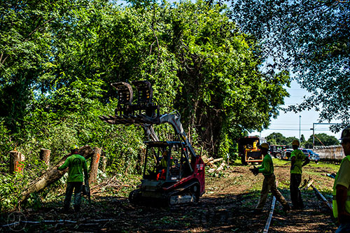 Crews remove trees from the Atlanta Beltline Eastside Trail extension in Reynoldstown.
