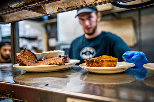 Back in the kitchen filling orders during lunch time on a Tuesday at Fox Bros. Barbecue off of Dekalb Ave. in Atlanta.