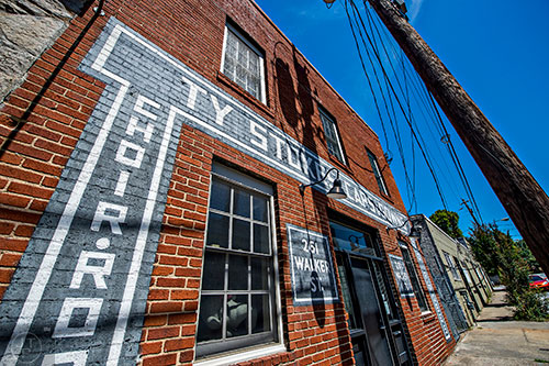 The Ty Stokes Caps and Gowns building on Walker Street in the Castleberry Hill neighborhood of Atlanta.
