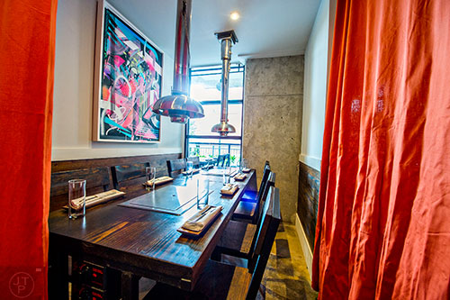 Char offers a semi private table near the bar that has curtains to give a more intimate dining experience.