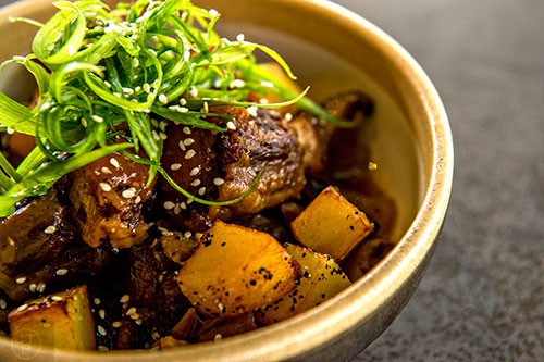 Char serves up the Kkorijjim, braised oxtail with confit potatoes and jus.