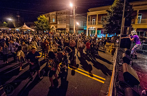 Band X performs during the 2016 Alpharetta Brew Moon Festival on Saturday, October 1, 2016.