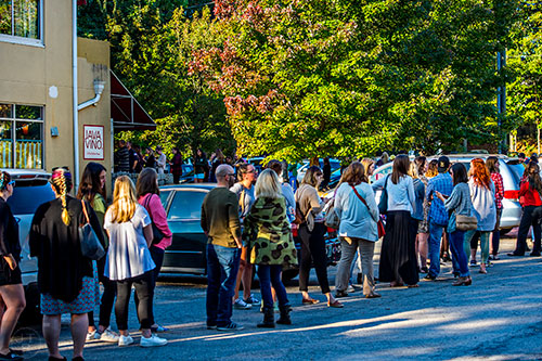 The line to get into JavaVino in Atlanta during the Netflix Gilmore Girls Luke's Diner Takeover on Wednesday morning spilled out the door and snaked through the parking lot next door.