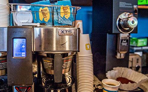 The last of the 500 Luke's Diner themed coffee sleves sit on top of a pot of brewing coffee during the Netflix Gilmore Girls Luke's Diner Takeover at JavaVino in Atlanta on Wednesday morning.