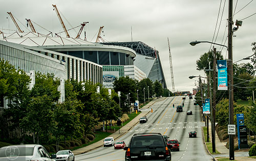 Shot from Northside Dr., the Georgia World Congress Center, the Georgai Dome and Mercedes Benz Stadium line up in a row.