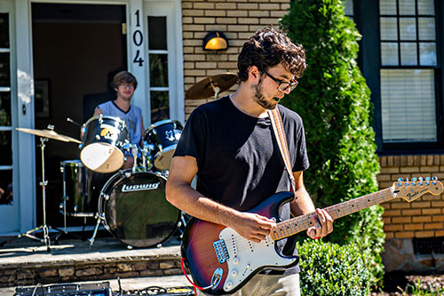 Tongue Karate's Emiliano Warren (right) and Jake Miller perform off of Cambridge Ave. during the annual Oakhurst PorchFest on Saturday.