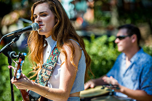 Sydney Rhame performs off of Mead Rd. during the annual Oakhurst PorchFest on Saturday.
