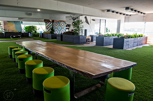 Communal seating inside the SCAD Pad section of the parking deck at SCAD's Atlanta campus.