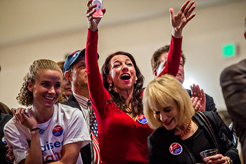 Mia Hofmann (center) reacts during the GOP Election Party at the Tech Center Doubletree Hotel in Denver on Tuesday, November 8, 2016.