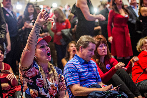 Leelee Fertig (left) reacts as Florida is called Democratic during the GOP Election Party at the Tech Center Doubletree Hotel in Denver on Tuesday, November 8, 2016.