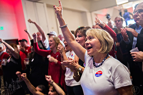 Denise Drager (right) reacts as states are called Republican during the GOP Election Party at the Tech Center Doubletree Hotel in Denver on Tuesday, November 8, 2016.